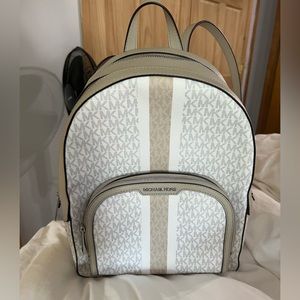 Michael Kors tan/sand medium sized backpack